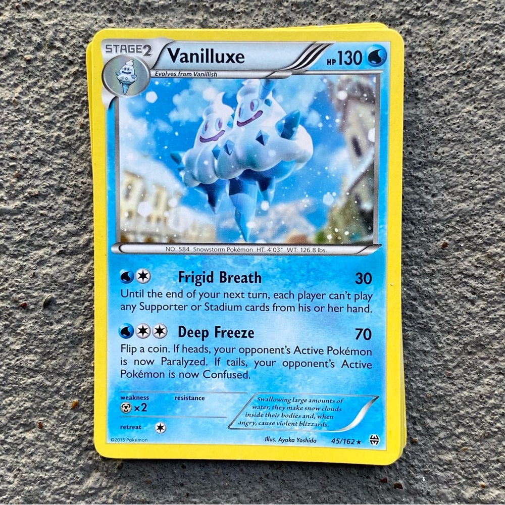 Pokemon Vanilluxe Trading Card - Blue and Yellow